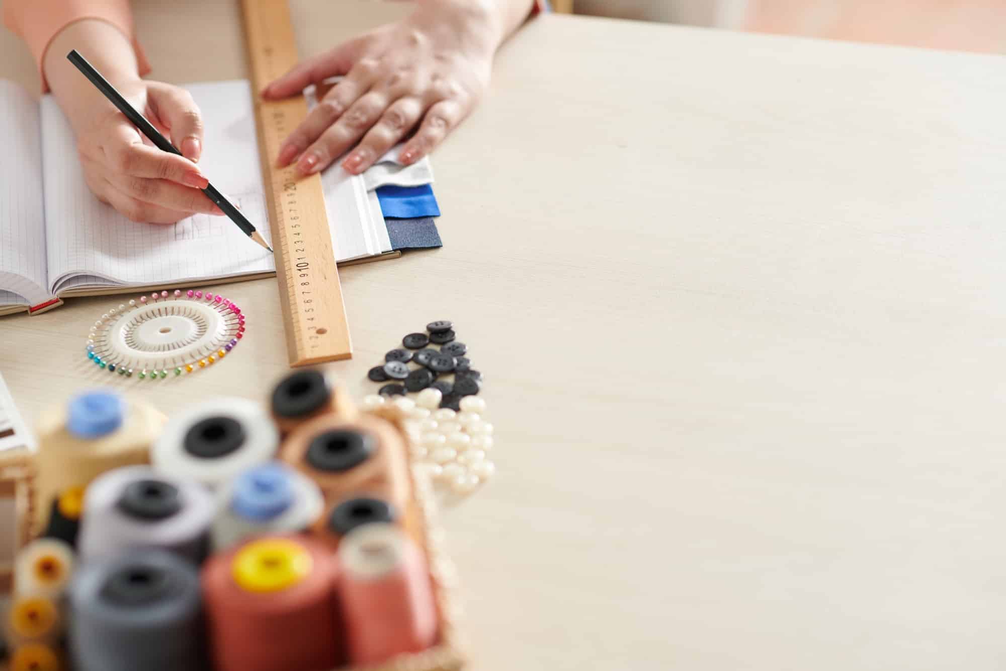 Seamstress Making Technical Drawing